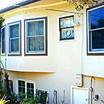 Back exterior of home before: image 1 0f 4 thumb