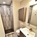 Second bathroom with wall mounted round toilet: image 8 0f 11